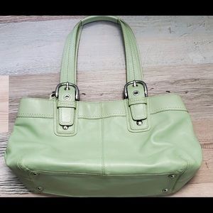 Coach light green purse.